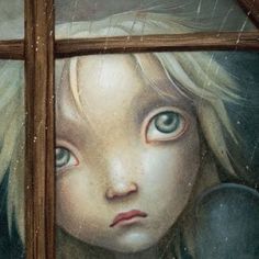 Kind schaut durch Fenster