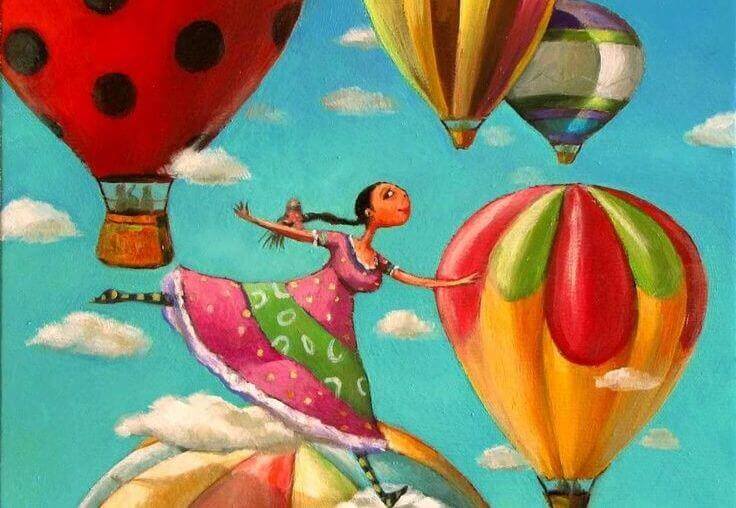 Frau tanzt auf Heißluftballons