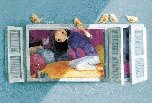 Maedchen schaut aus dem Fenster