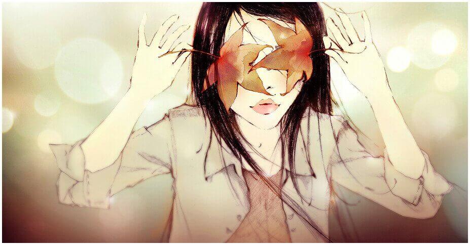 Frau verdeckt sich die Augen