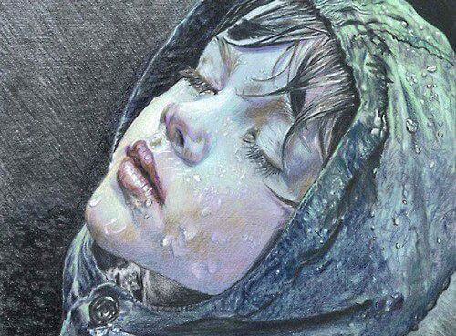 Kind im Regen