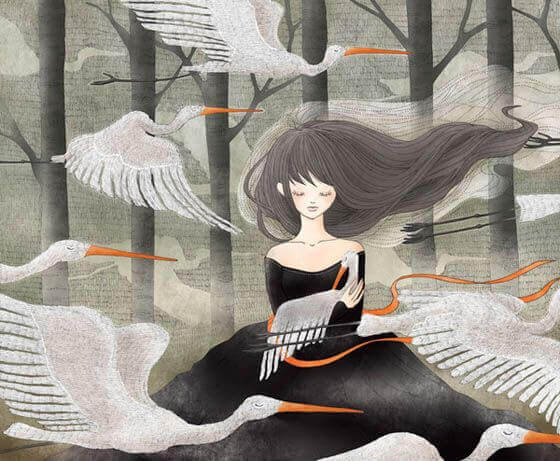 Frau von Kranichen umgeben