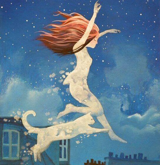 Mädchen und Katze springen