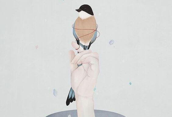 hand-mit-einem-vogel