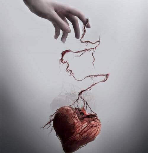 Herz als Marionette am Finger einer anderen Person