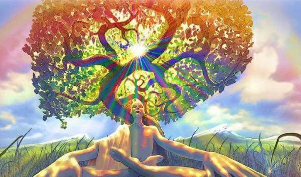 Frau meditiert vor einem Baum, der ein Gehirn zu sein scheint