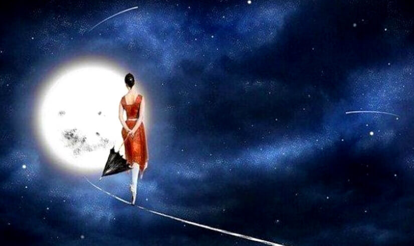 Frau tanzt auf einem Seil vor dem Mond
