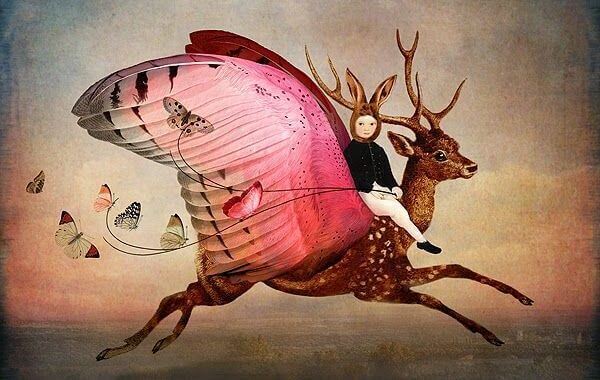 Kind sitzt auf Fabelwesen