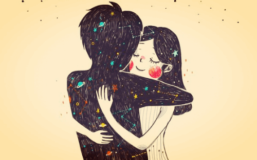 Ein Liebespaar umarmt sich vor dem Sonnensystem