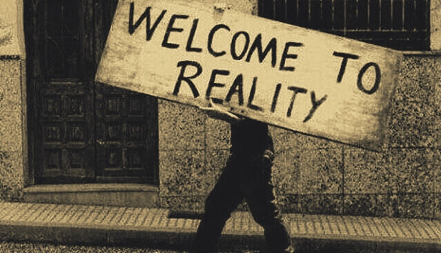 Plakat mit der Aufschrift "Willkommen in der Realität"