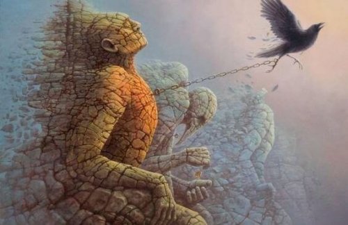 Steinmensch ist an Krähe gefesselt