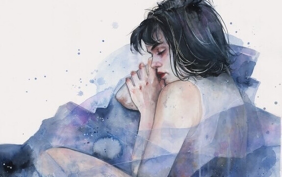 Ängstliche Frau in fötaler Haltung.