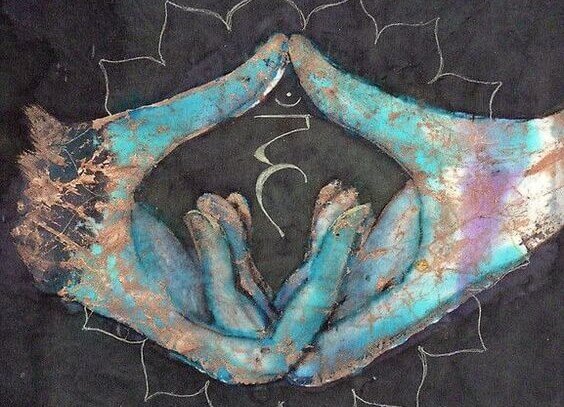 Hände, die den Buddhismus symbolisieren