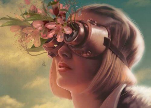 Frau mit Schutzbrille, die mit Blumen bestückt ist