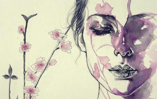 Frau mit geschlossenen Augen und Blumen
