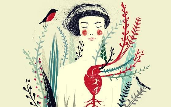 Frau mit rotem Herz und umgeben von Pflanzen