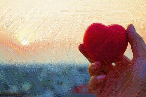 Rotes Herz in einer Hand