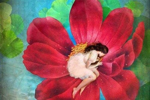 Frau schläft in einer Blume