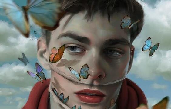 Schmetterlinge fliegen um das Gesicht eines Mannes herum