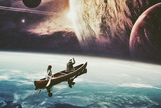 Paar fährt in einem kleinen Boot in Richtung Planeten