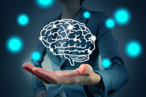 Hand mit Umriss eines digitalen Gehirns