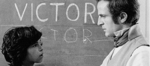 Bild von Victor de Aveyron vor einer Tafel, mit einem Lehrer