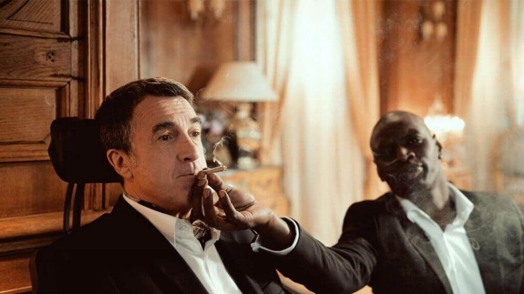 Philippe raucht zusammen mit Driss