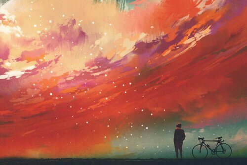 Mann mit Fahrrad blickt gen Himmel, symbolisch für das Schicksal