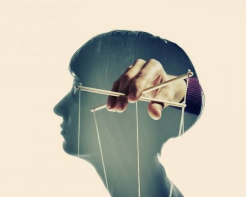 Illustration eines Kopfes und Puppenspieler