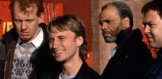 Die Filmfiguren von "Ganz oder gar nicht" lachen in die Kamera.