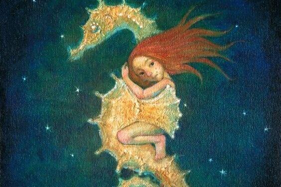 Mädchen sitzt auf einem Seepferdchen