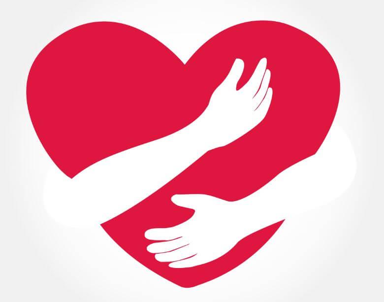 Rotes Herz wird umarmt