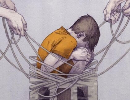 Ein Junge ist gefangen im Netz des Mobbings.