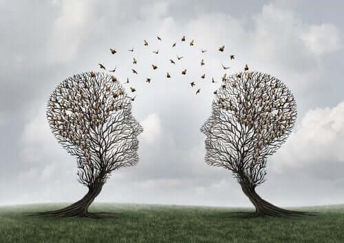 Zwei Bäume in Form von Köpfen, die die Psychologie der Sprache darstellen.